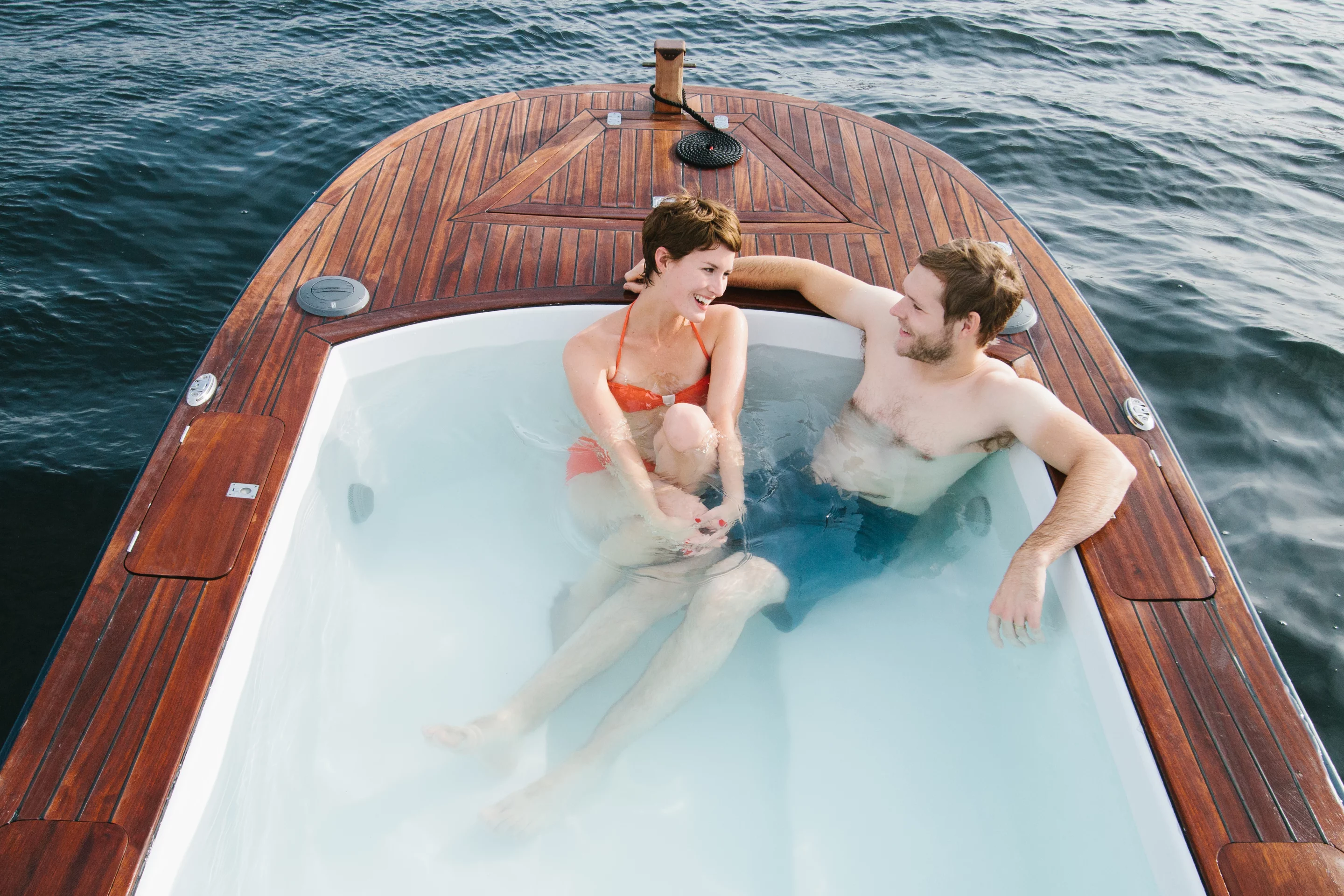 The Hot Tub Boat allows its passengers to soak while they cruise