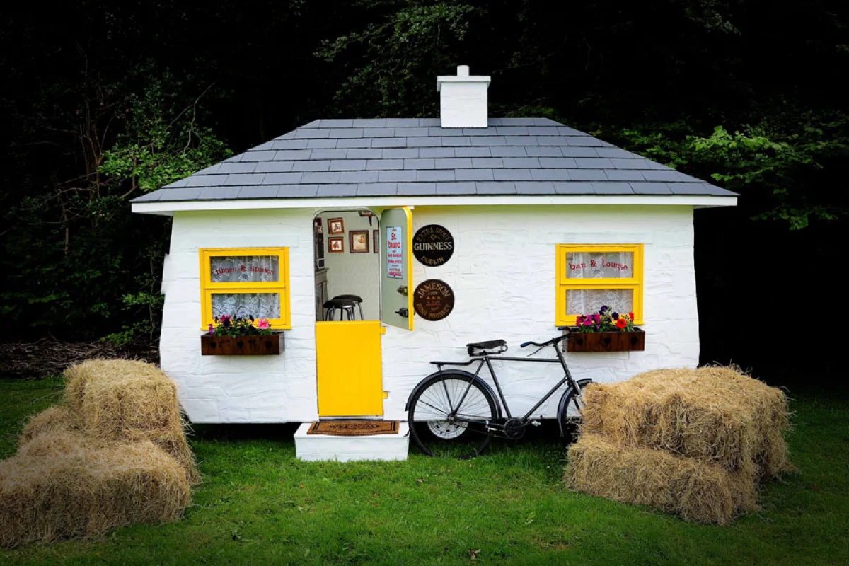 The Shebeen portable pub comes well-stocked and includes glasses, alcohol, mixers, and everything else you'd need for a good time