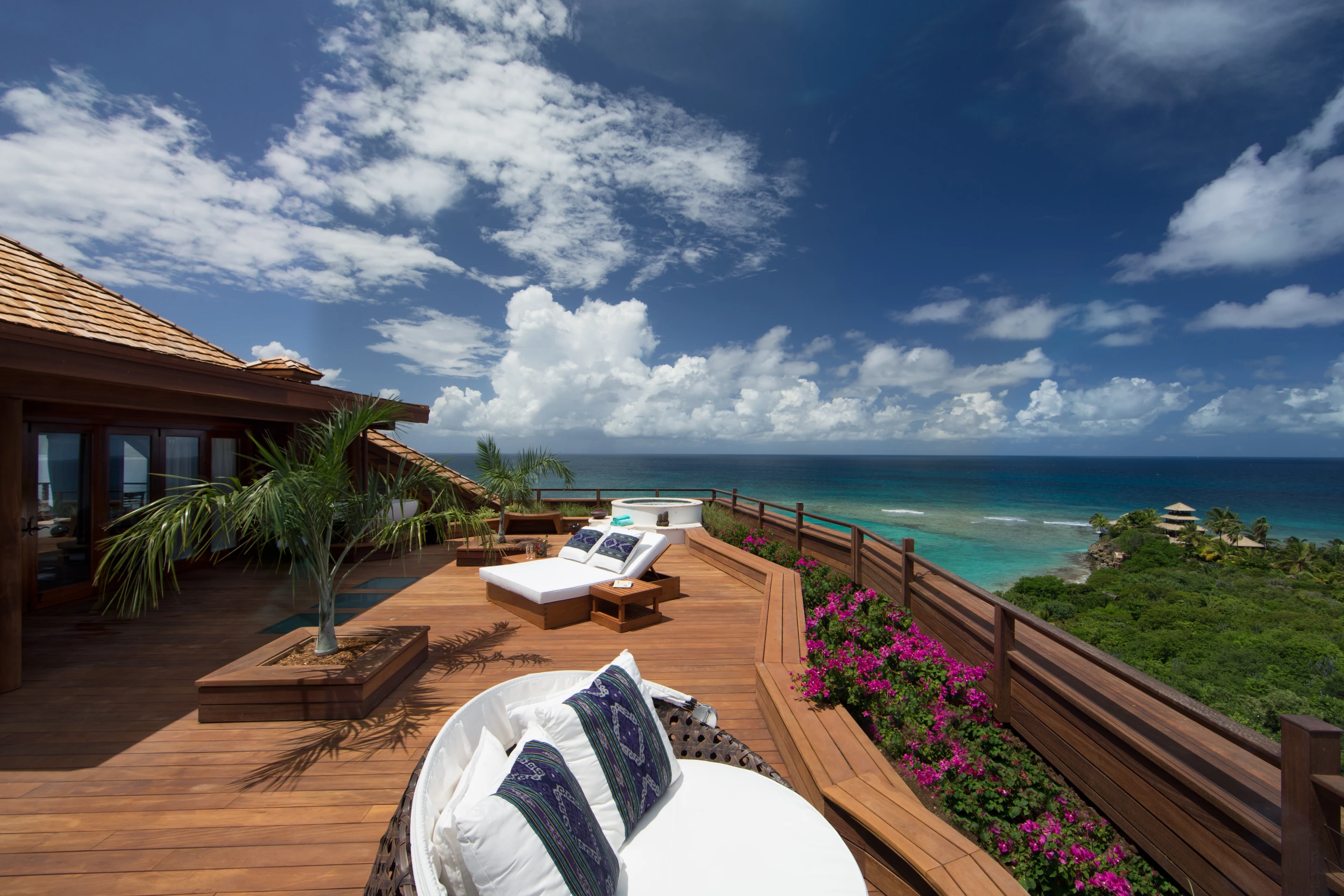The house boasts an outdoor terrace complete with hammocks and dining area, not to mention a pre-stocked cocktail bar