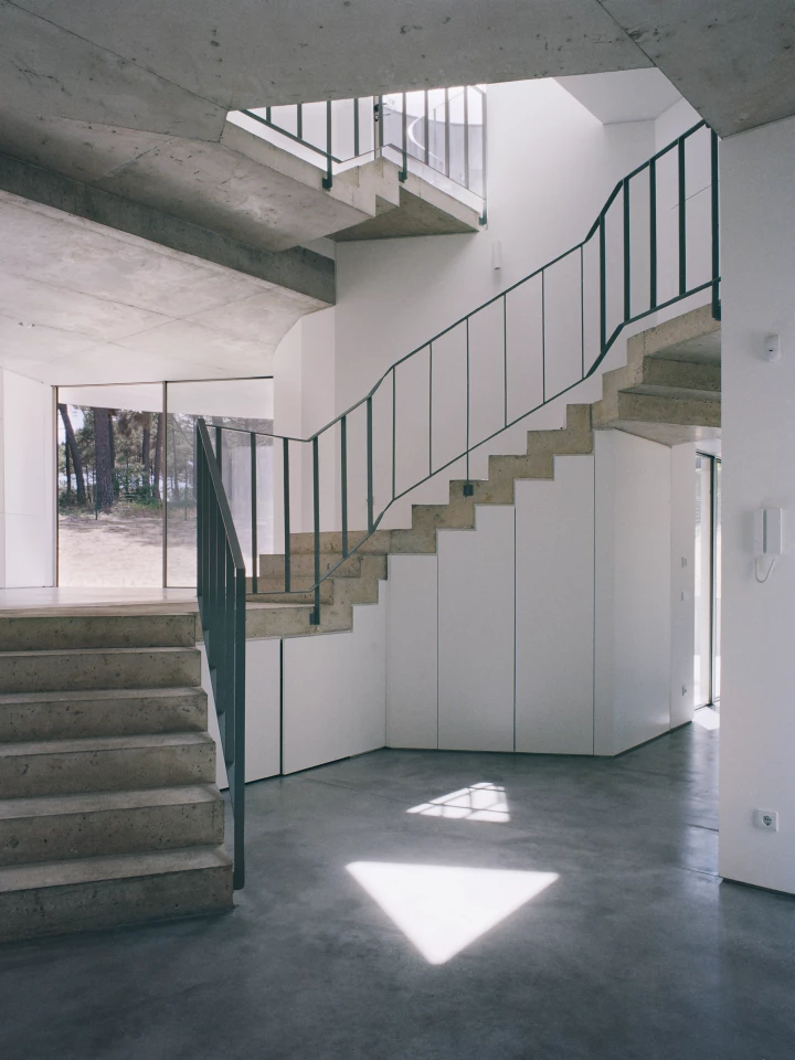 Casa Trevo features underfloor heating to keep toes toasty despite the cold-looking concrete