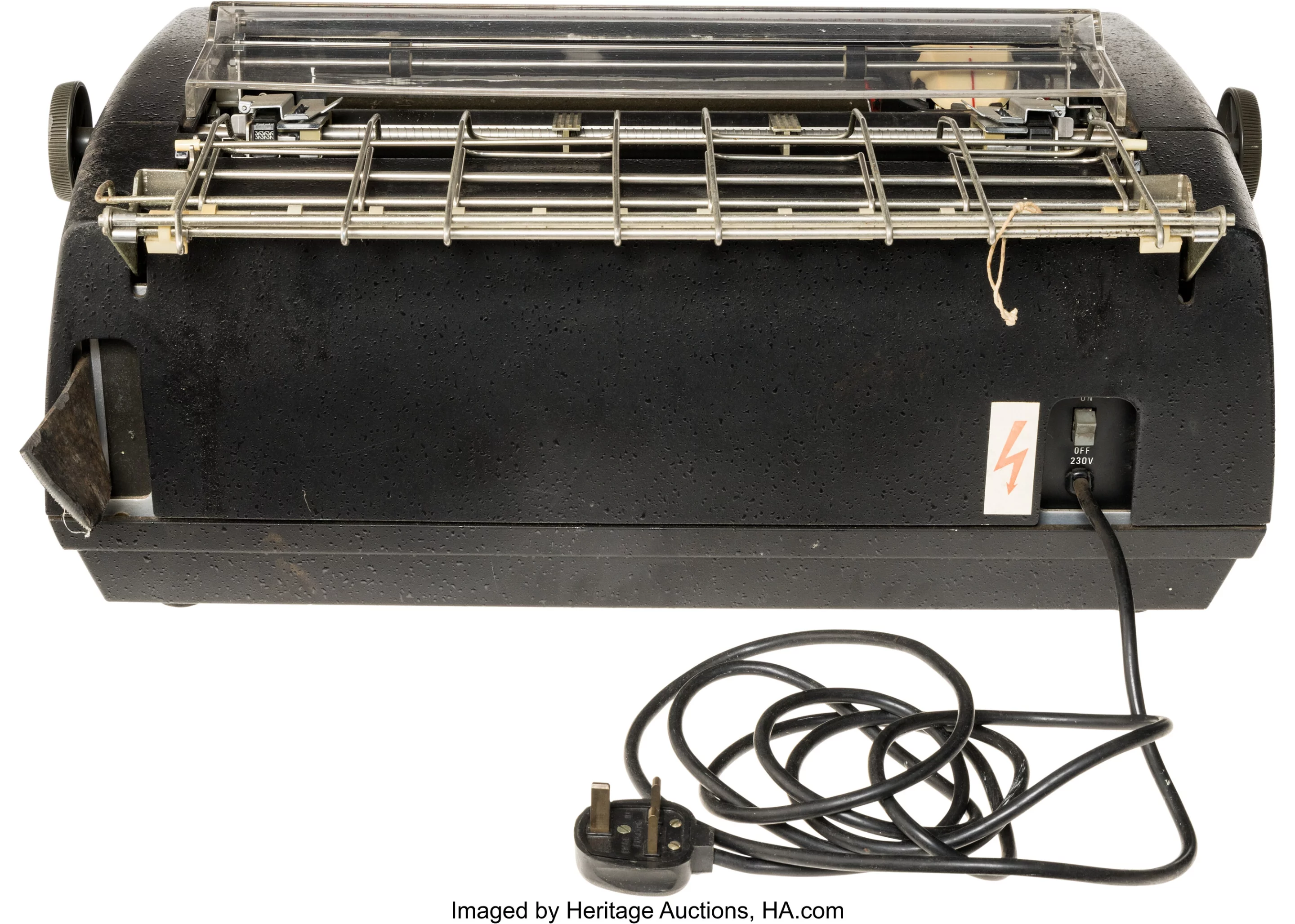 The Q1 printer with power cable