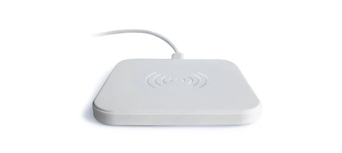 The TrackerPad is charged wirelessly via a wireless charging pad