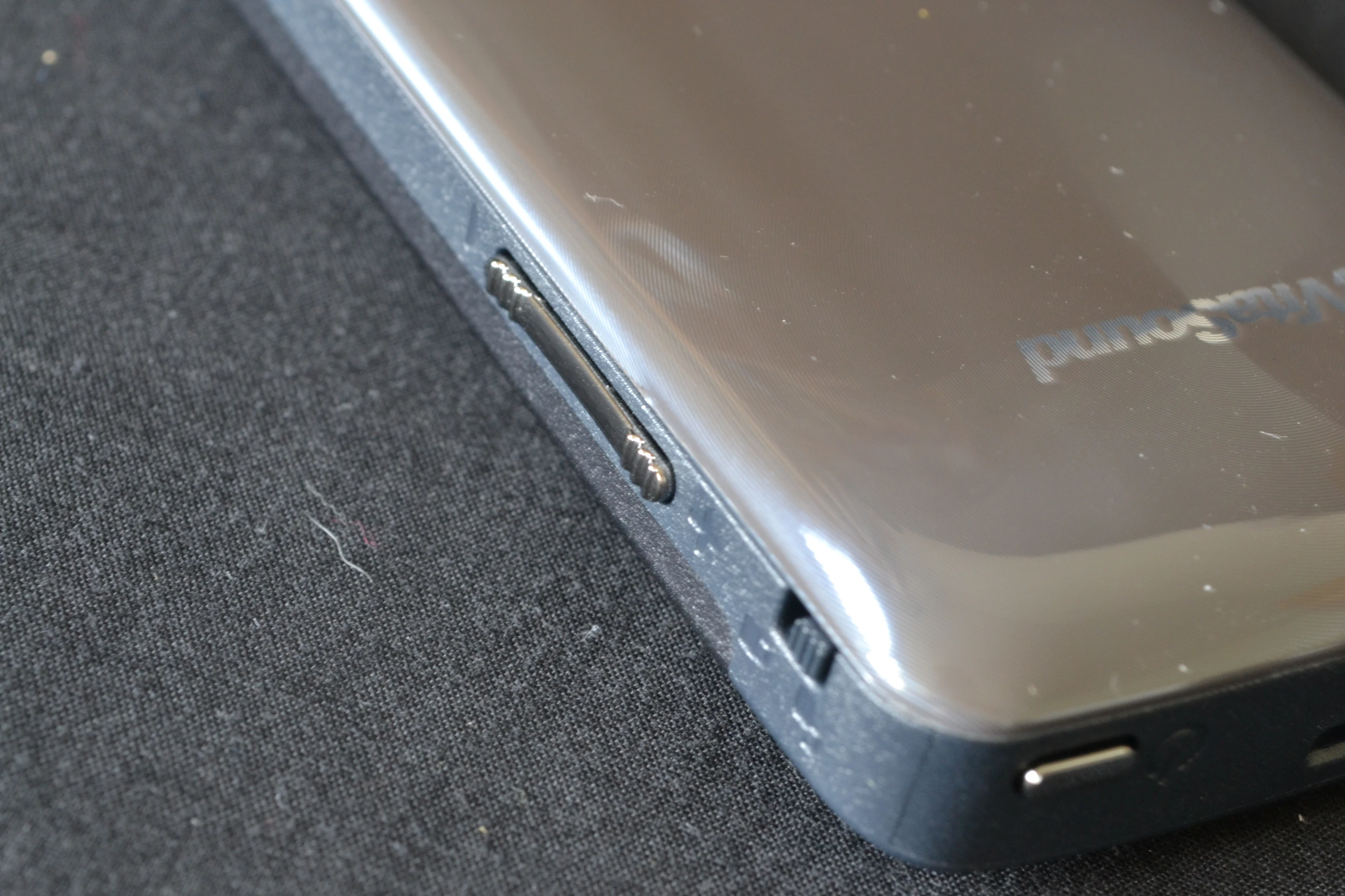 On the right side of the handset is a volume rocker and a lock button