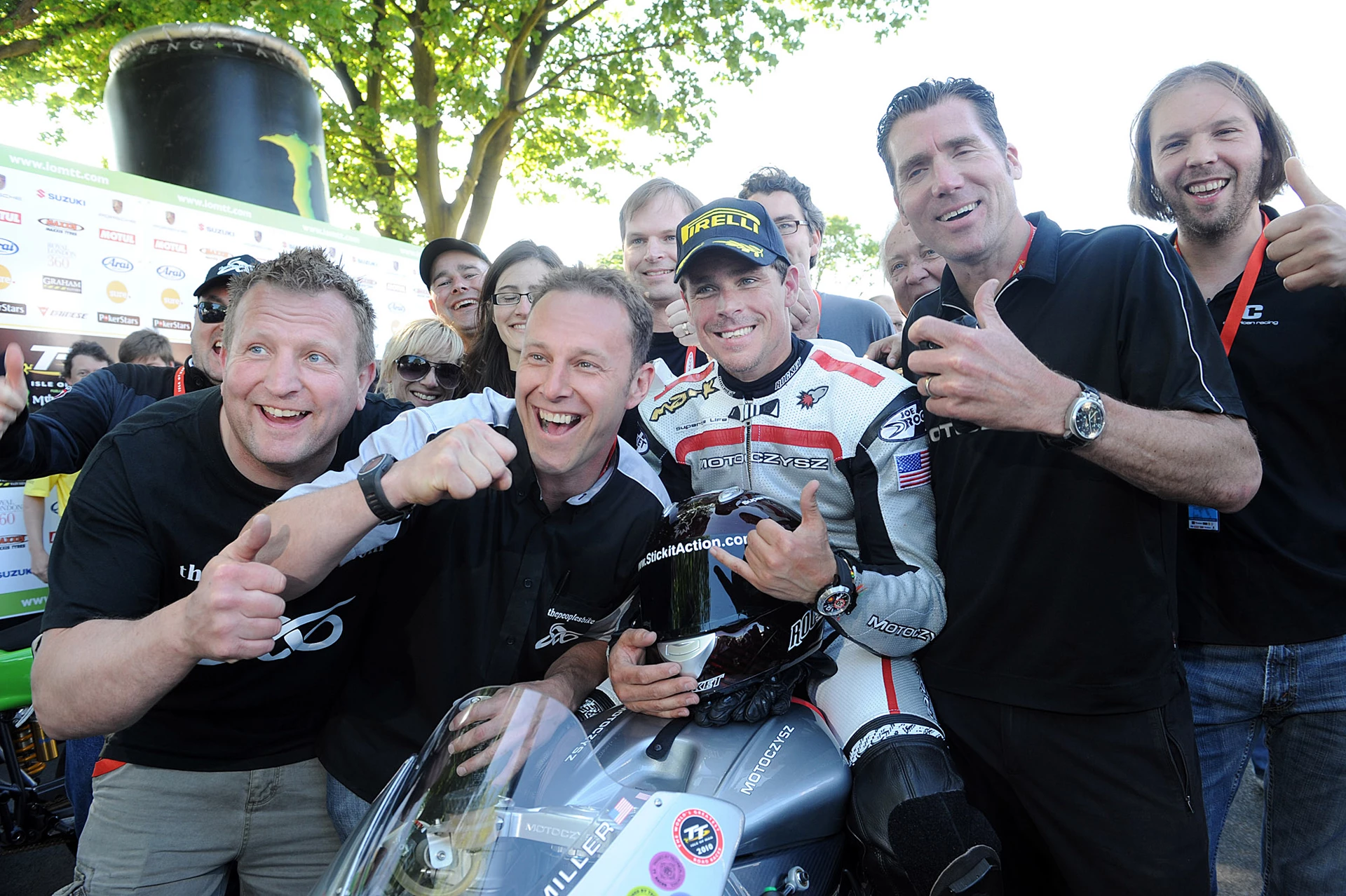 The MotoCzysz team whoops it up after the event