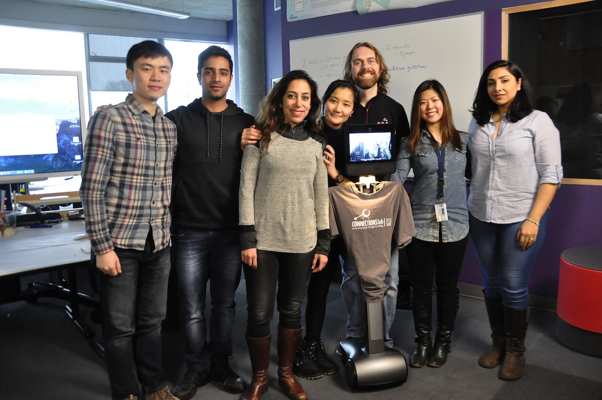 The Simon Fraser University team, and the telepresence robot they've been working with
