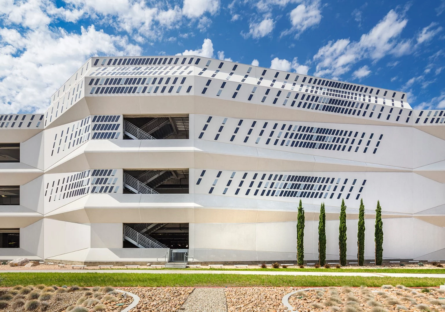 The Dazzle installation is made up of 2,100 E Ink Prism film panels, transforming the facade into a huge animated mural