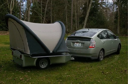 The Setzers have towed the ScarabRV by both bike and Prius