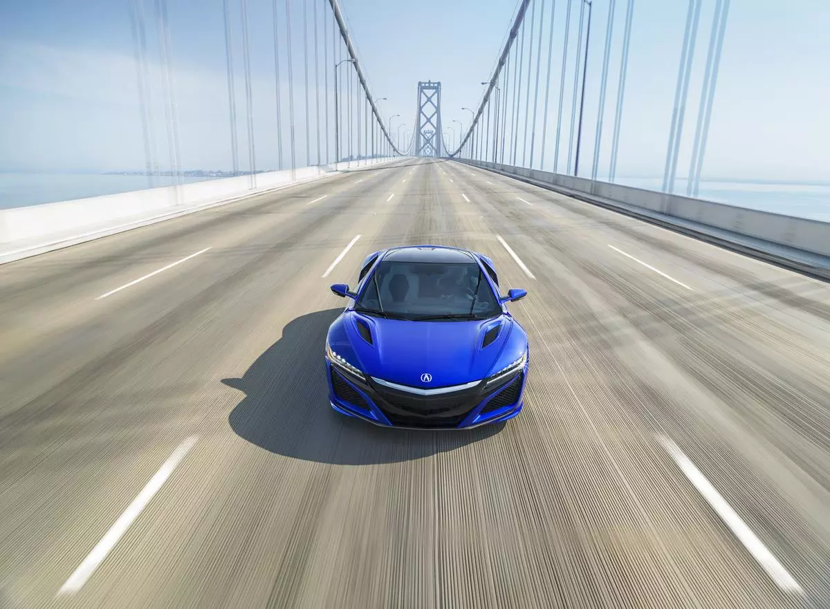 Acura has released technical details about the hybrid sports car, including its all-wheel drive platform and planned production for the 2017 model year