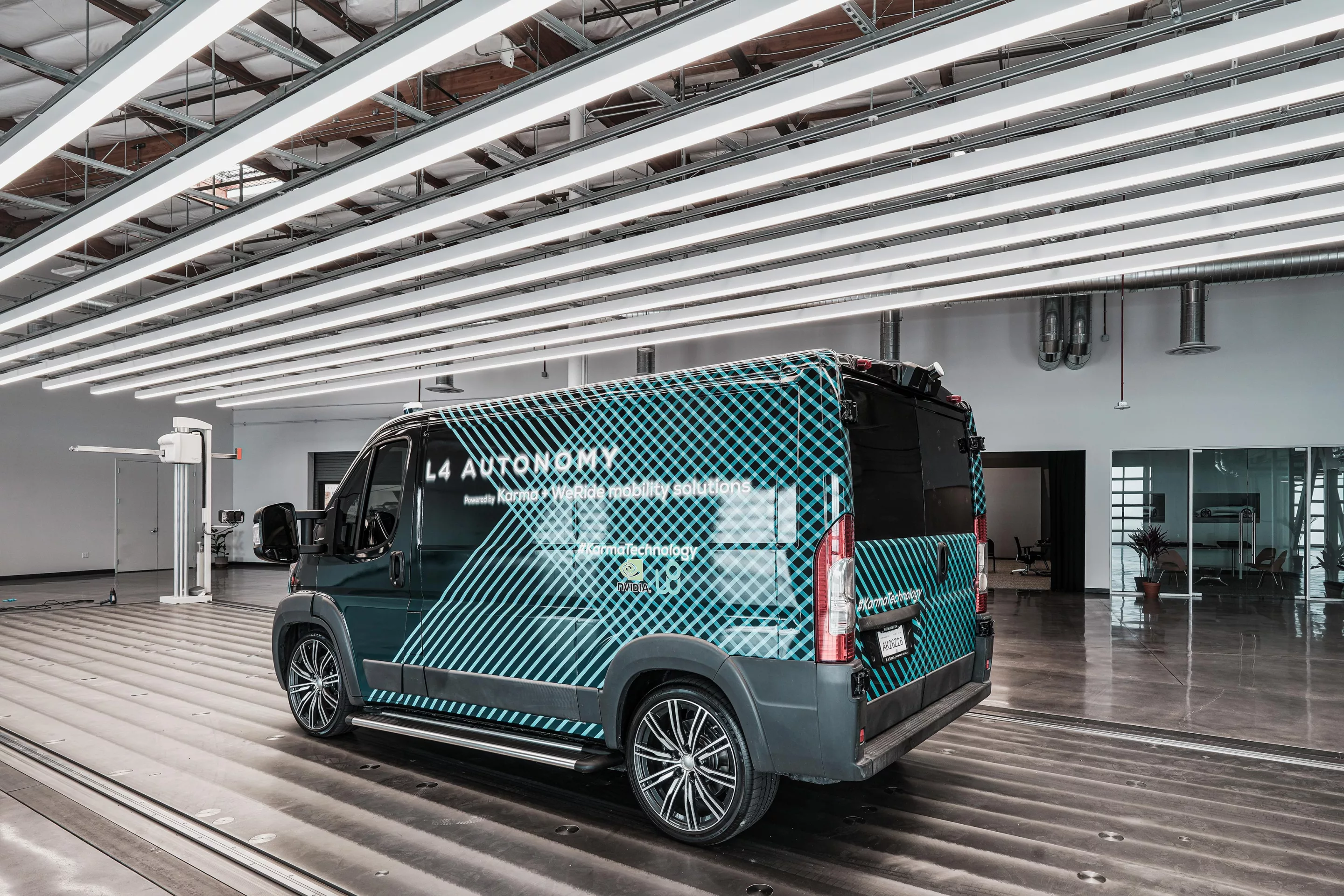 Karma foreshadows the autonomous electrified van of the future by detailing its L4 E-Flex Van platform, shown here on a Ram Promaster/Fiat Ducato