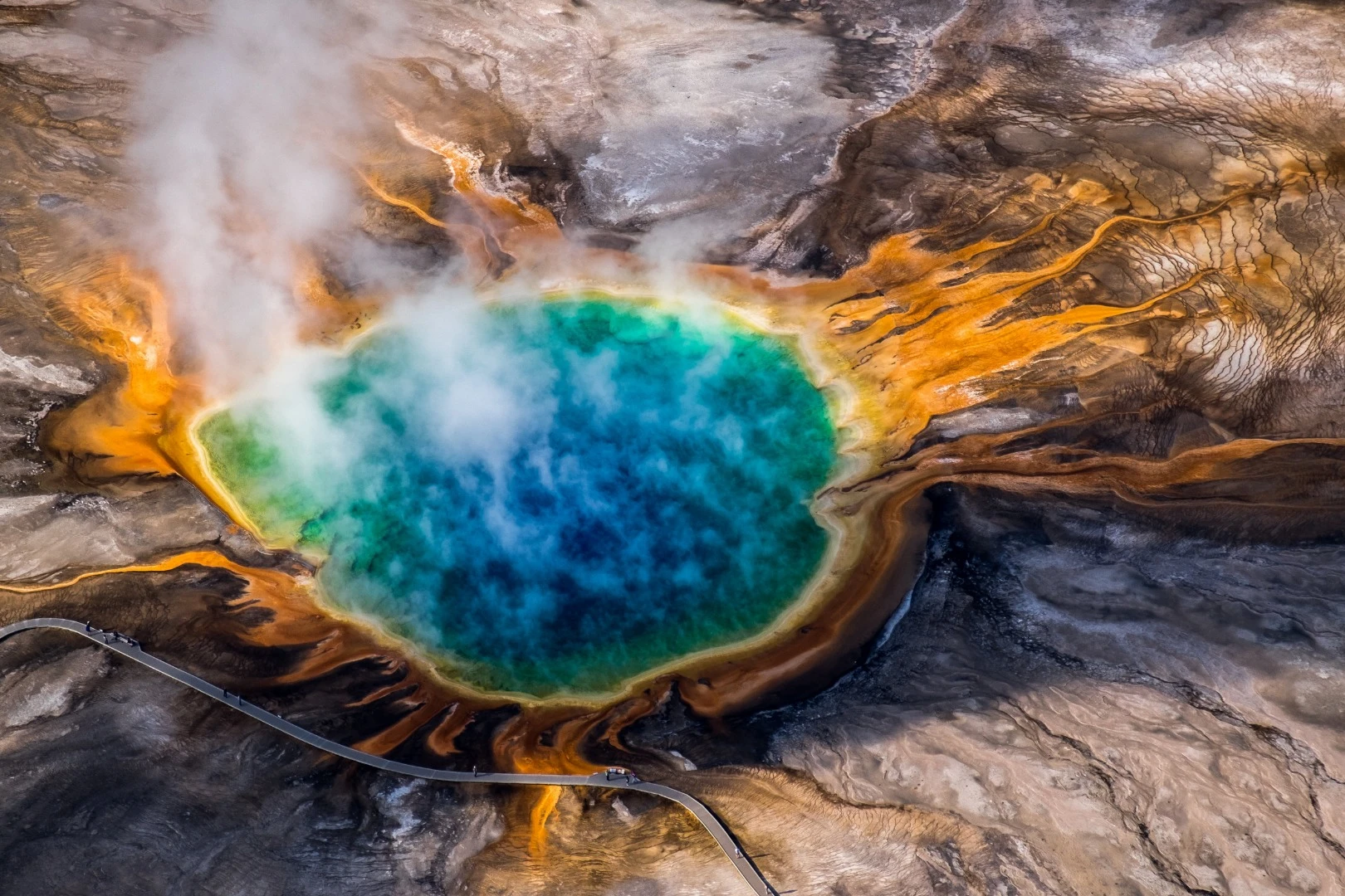 An eye - aerial shot of Grand prismatic spring in Yellowstone National Park