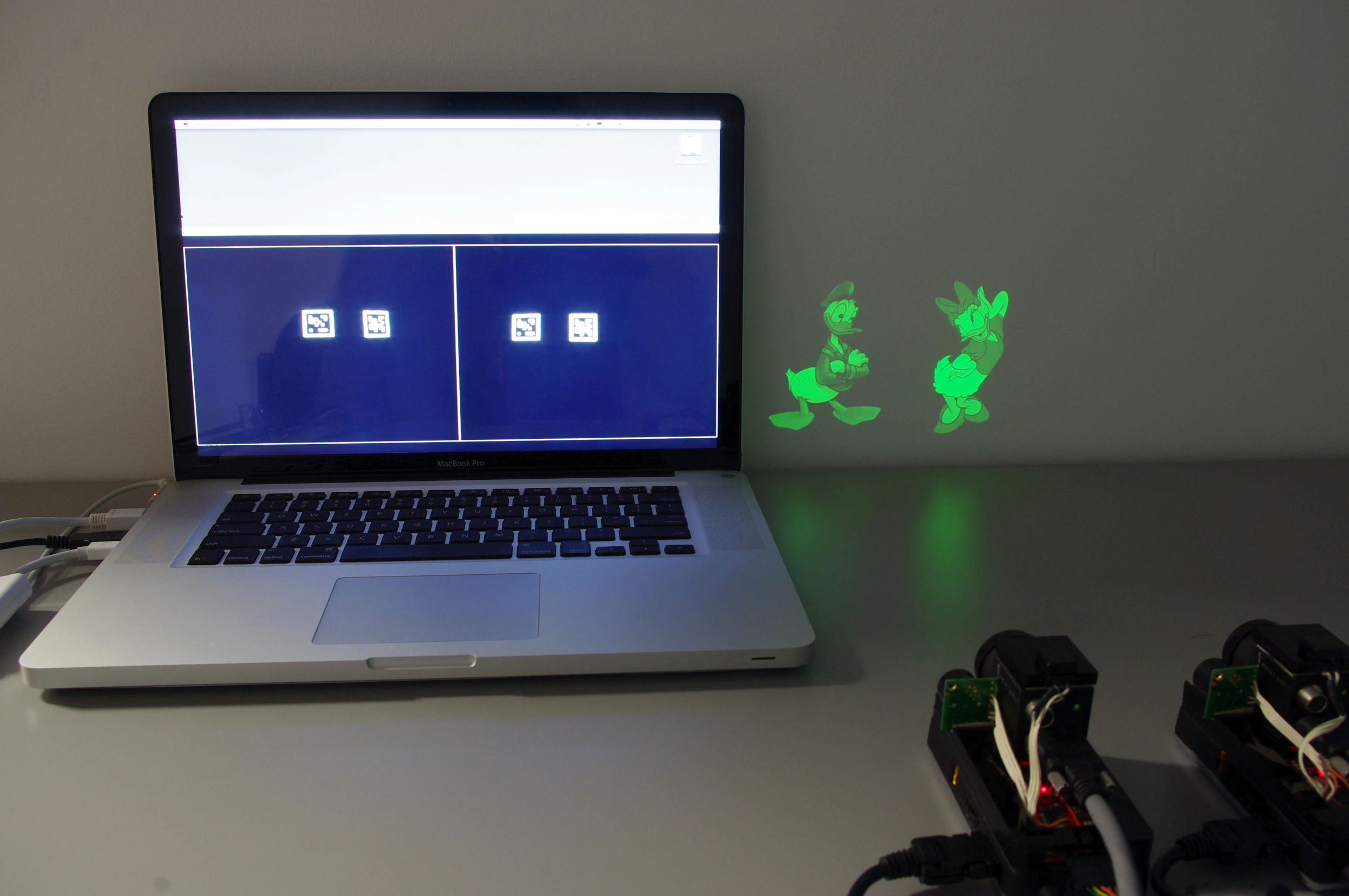 The SidebySide infrared marker codes (left) and the corresponding animated images (right) (Photo: Disney Research)