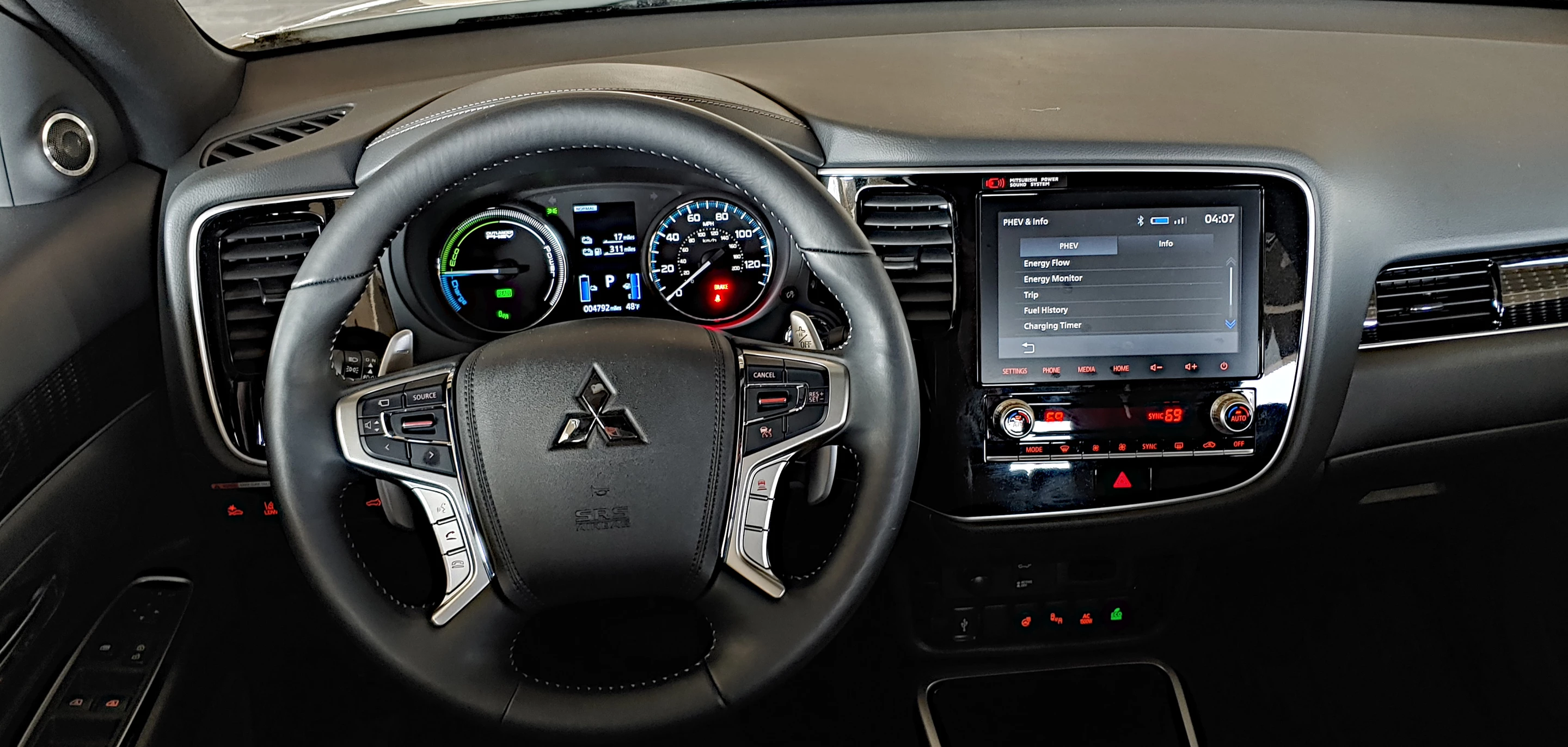 And 8-inch touchscreen is standard in the Outlander PHEV, as are several advanced safety tech items like forward collision warning and blind-spot management