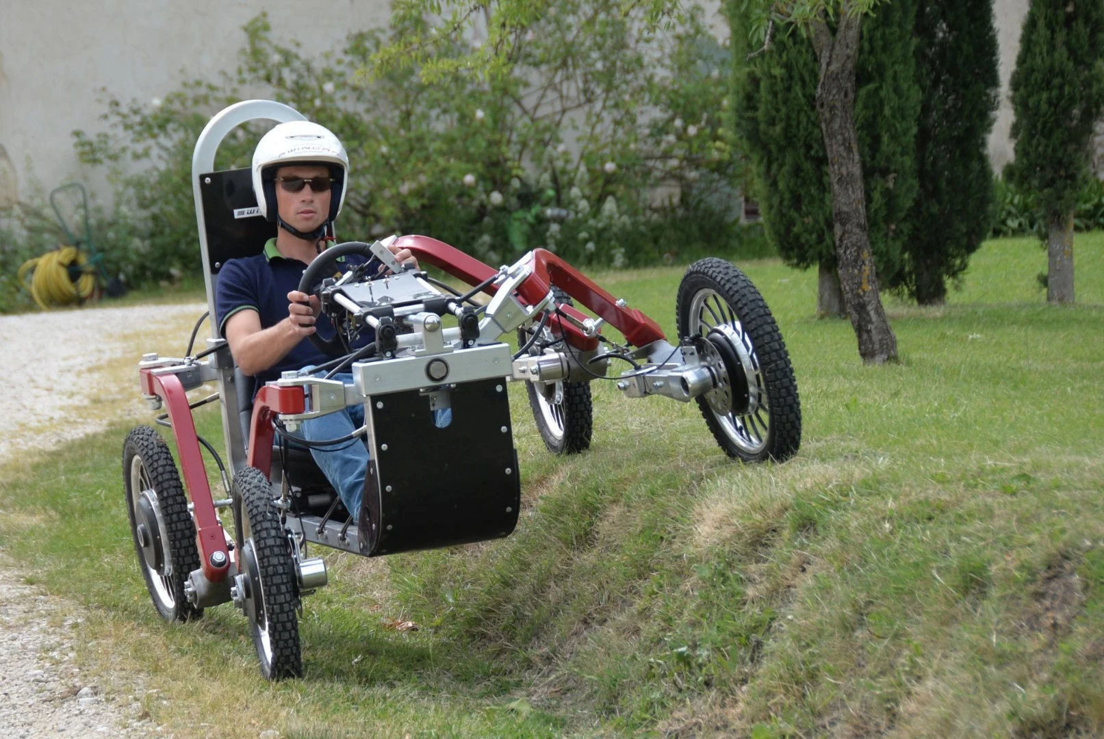 Swincar's ridiculous degree of independent suspension freedom allows it to keep a driver upright over some very strange terrain