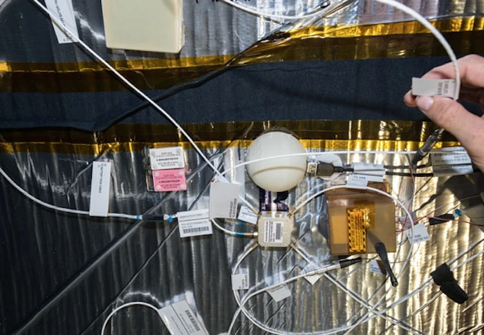 Astronauts have started a new radiation test in the BEAM, putting a semi-spherical 3D printed shield over one of two radiation sensors