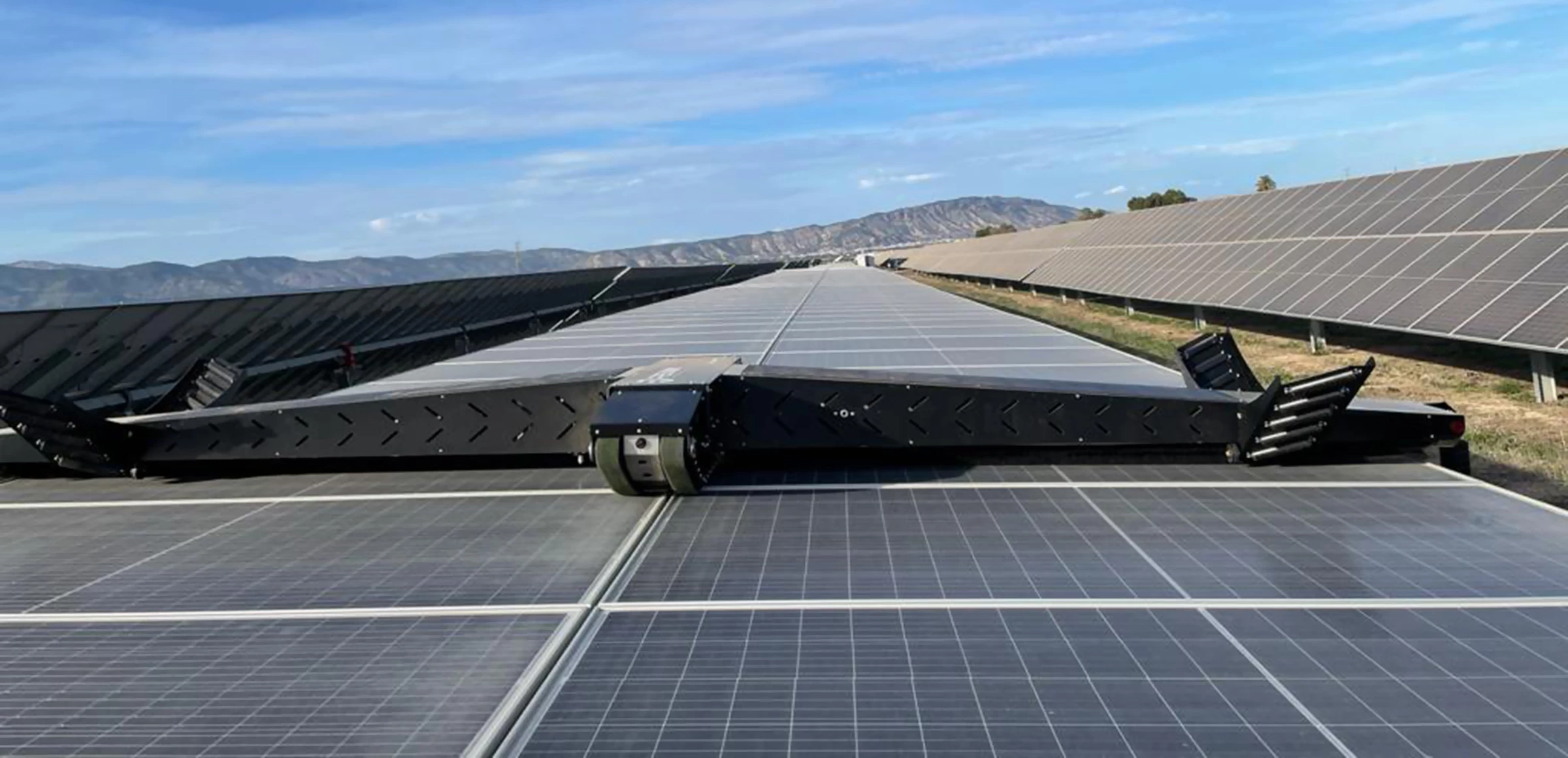 The SandStorm autonomous cleaning robot employs "a system of specially designed and manufactured brushes" to remove dust and debris from rows of panels at large solar farms
