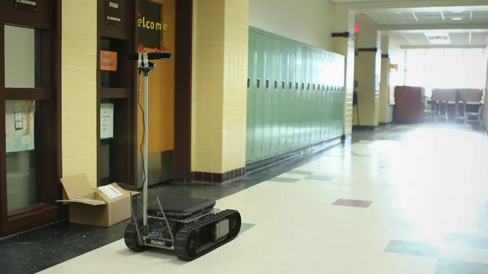 An iRobot PackBot navigates a school, in a demonstration of the Cognitive Patterns system
