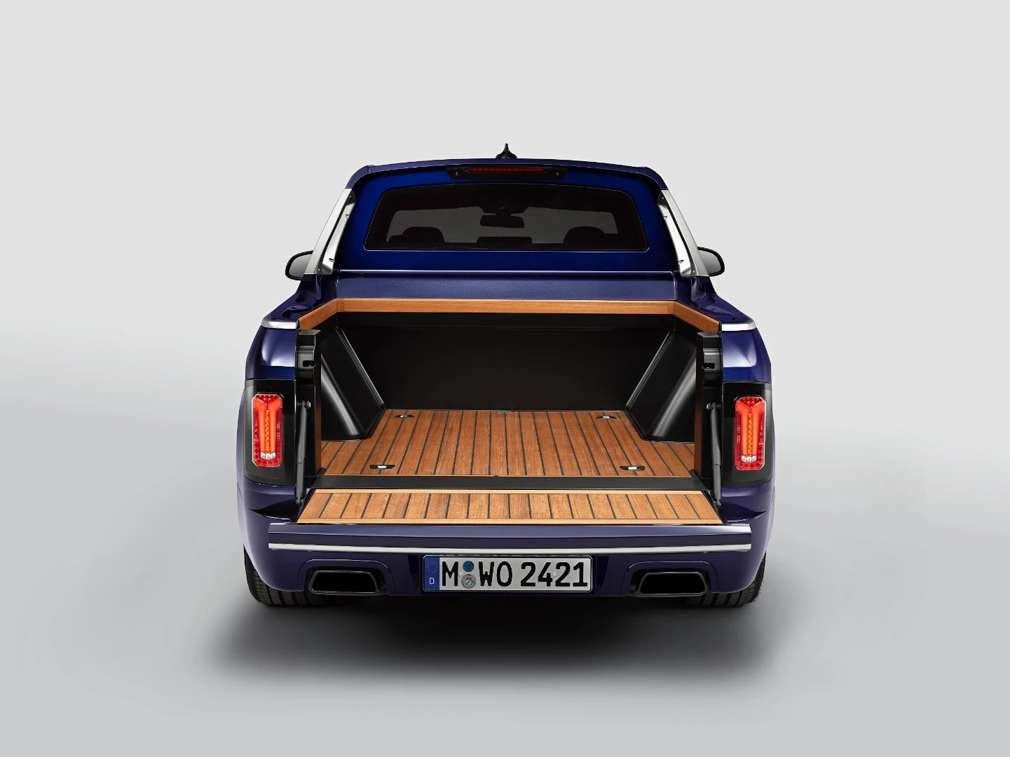 To make it a proper BMW truck, the bed gets lined in luxurious teakwood