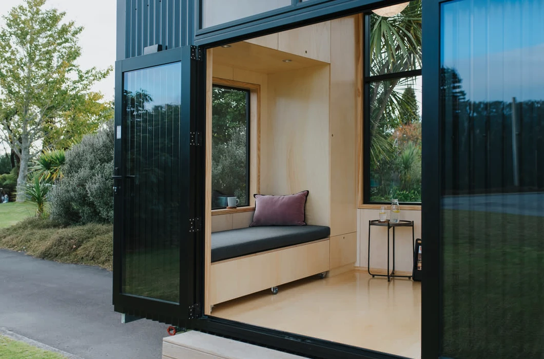 The First Light Tiny House is clad in corrugated steel