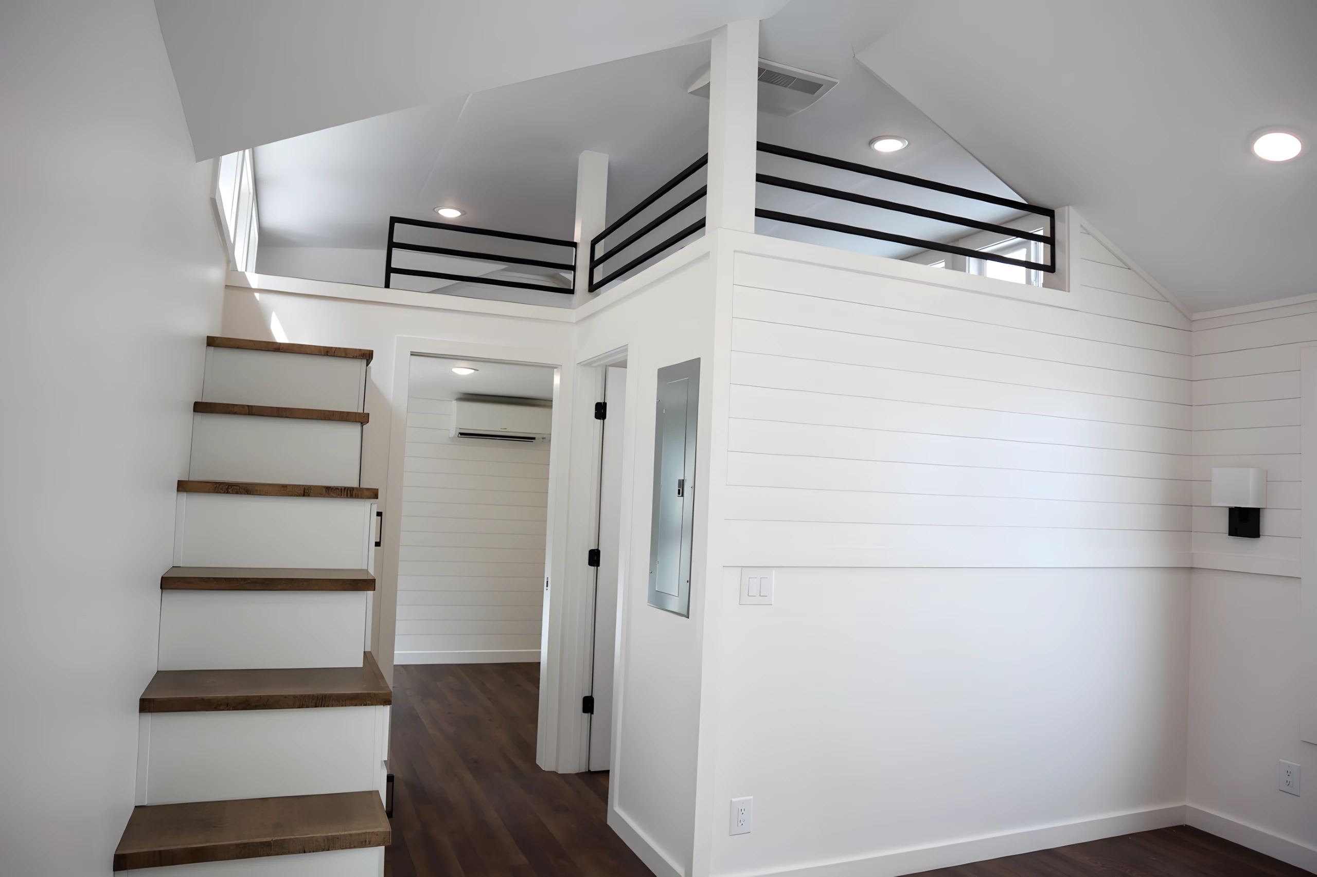 The Dogwood's upstairs area is reached by storage-integrated staircase