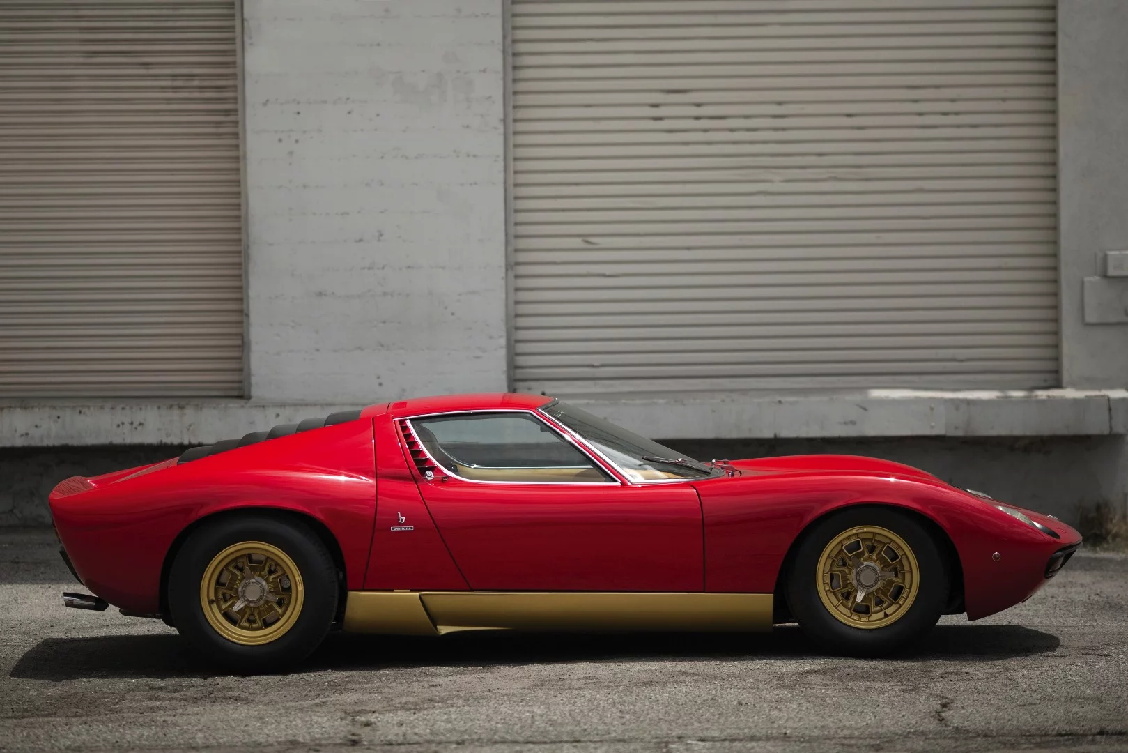 Lot 105 is a 1971 Lamborghini Miura P400 SVn which fetched $2,475,000 to set a new record for the model