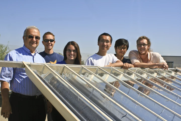 Professor Roland Winston and his student team, with an array of External Compound Parabolic Concentrators