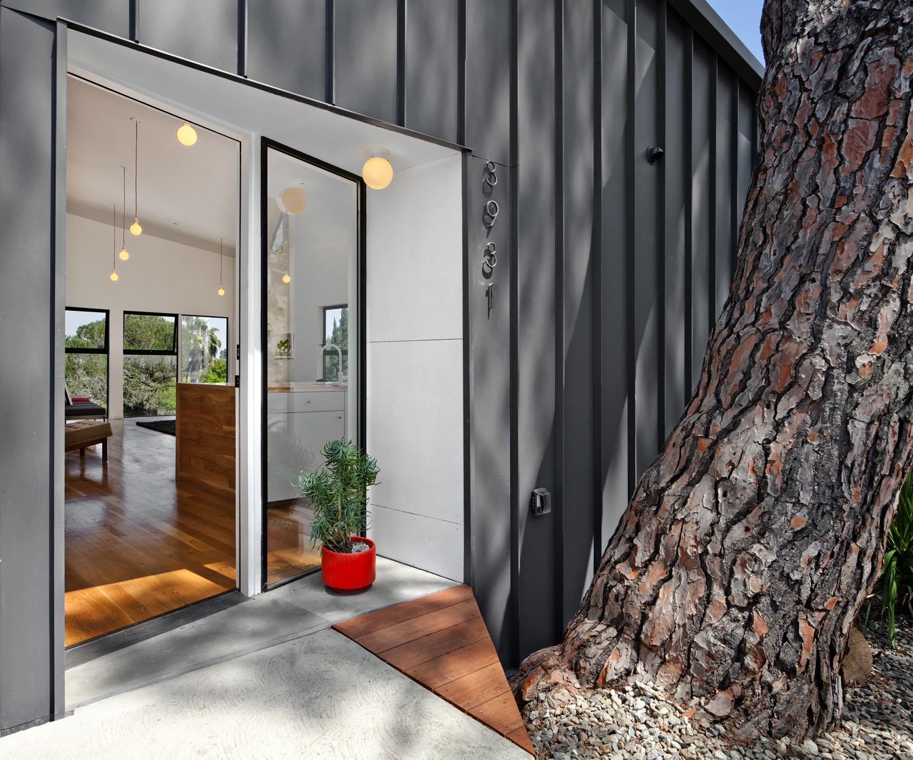 Owing to the concrete stilts it sits upon, the house doesn’t touch the ground at any point