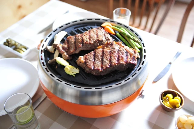 The Homping Grill provides 400° F (204° C) worth of heat with about eight charcoal briquettes