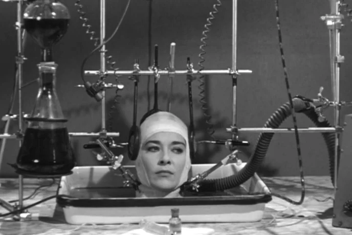 A woman's severed head awaits a new body, in the 1962 film The Brain That Wouldn't Die