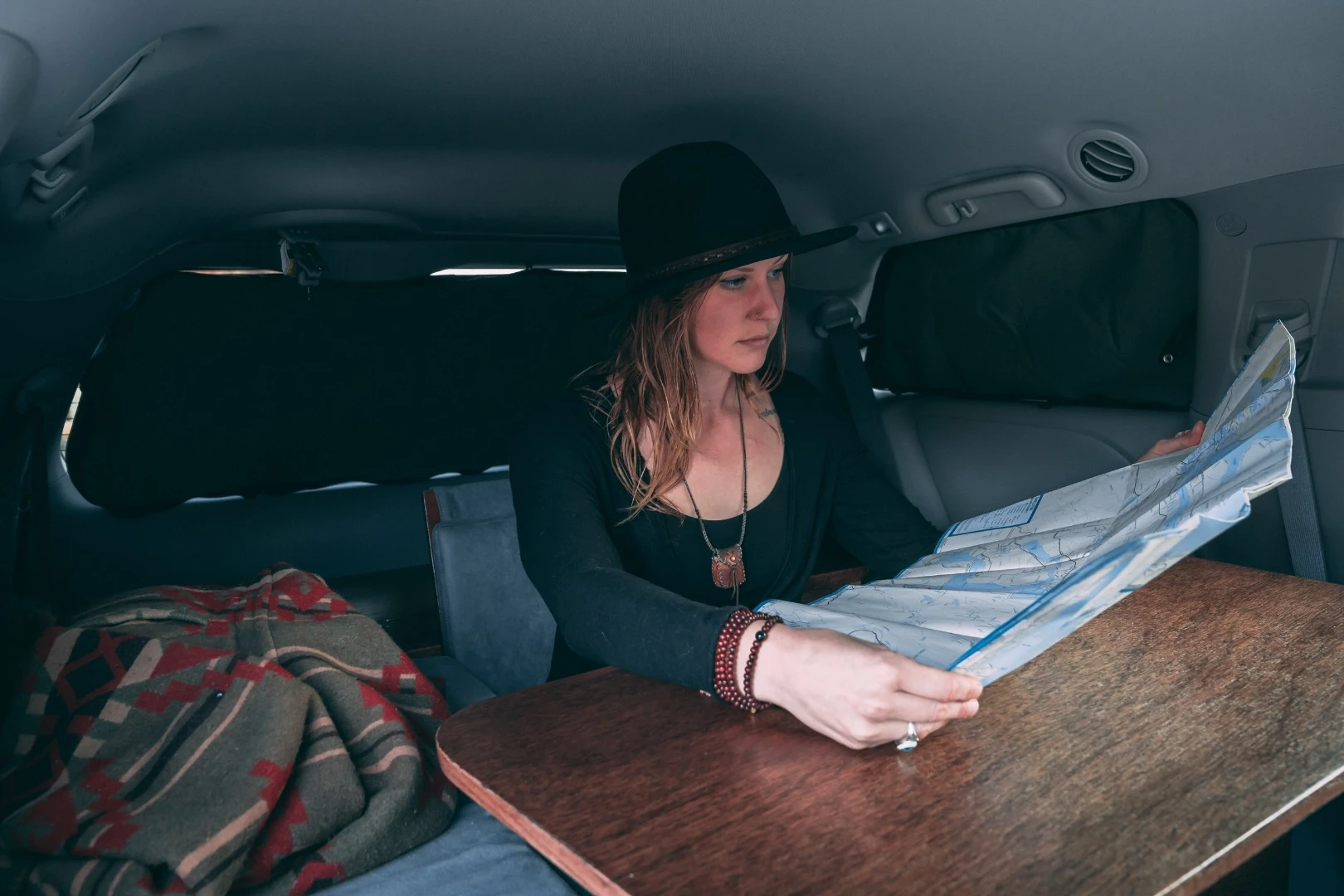 The Oasis camper conversion also includes window shades for a darker night of sleep