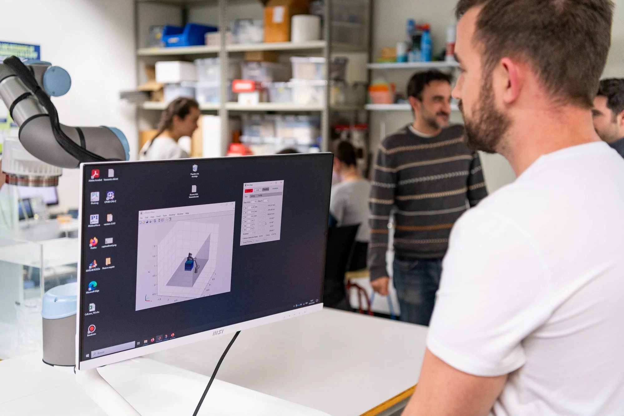 The system utilizes a robotic arm, guided by an imaging system