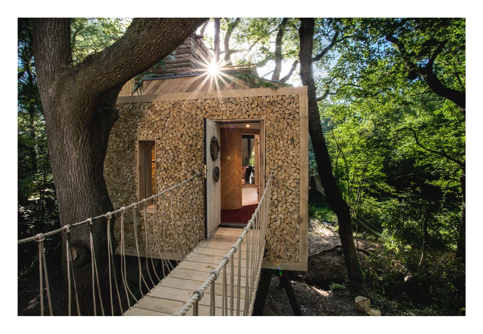 Access to the Woodsman's Treehouse is gained via bridge