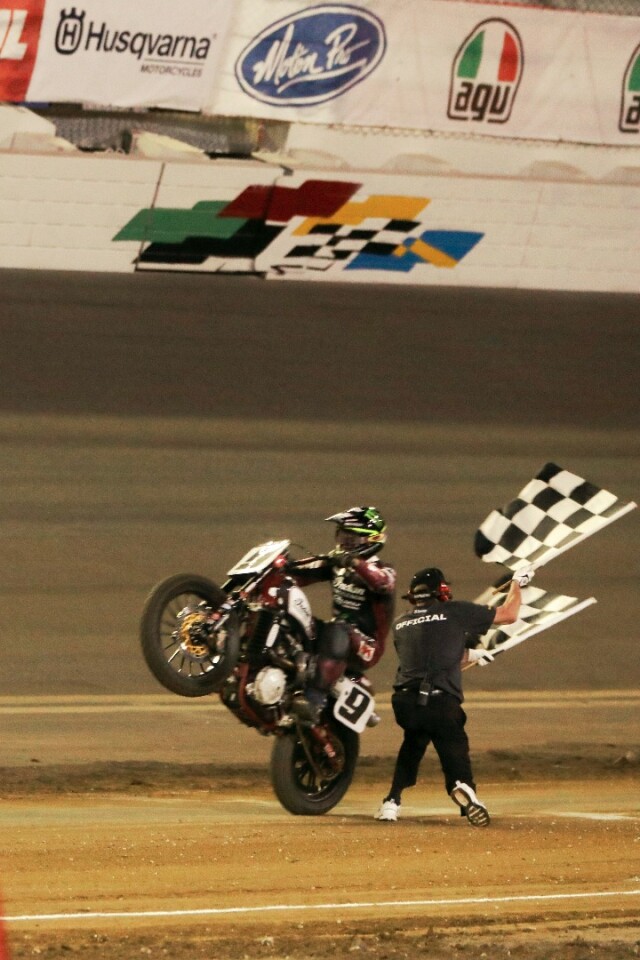 Jared Mees celebrates a win with a wheelie