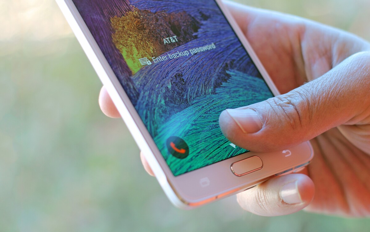 The Note 4's fingerprint sensor isn't as simple to use as the iPhone's Touch ID, but it's still improved over the GS5's sensor (Photo: Will Shanklin/Gizmag.com)