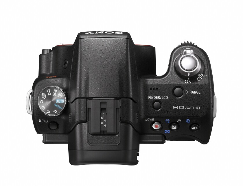 The controls on top of the SLT-A33, with familiar PASM dial and a dedicated movie button, a button for switching between Live View and viewfinder and the shutter release