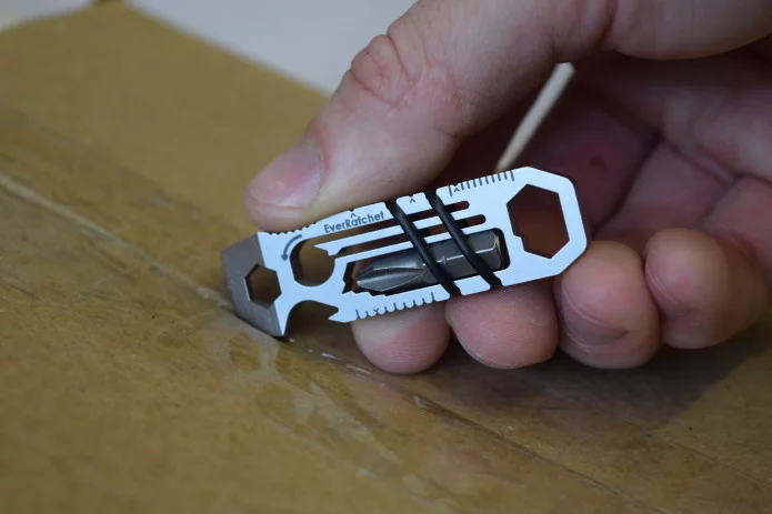 The EverRatchet multitool in action as a box cutter