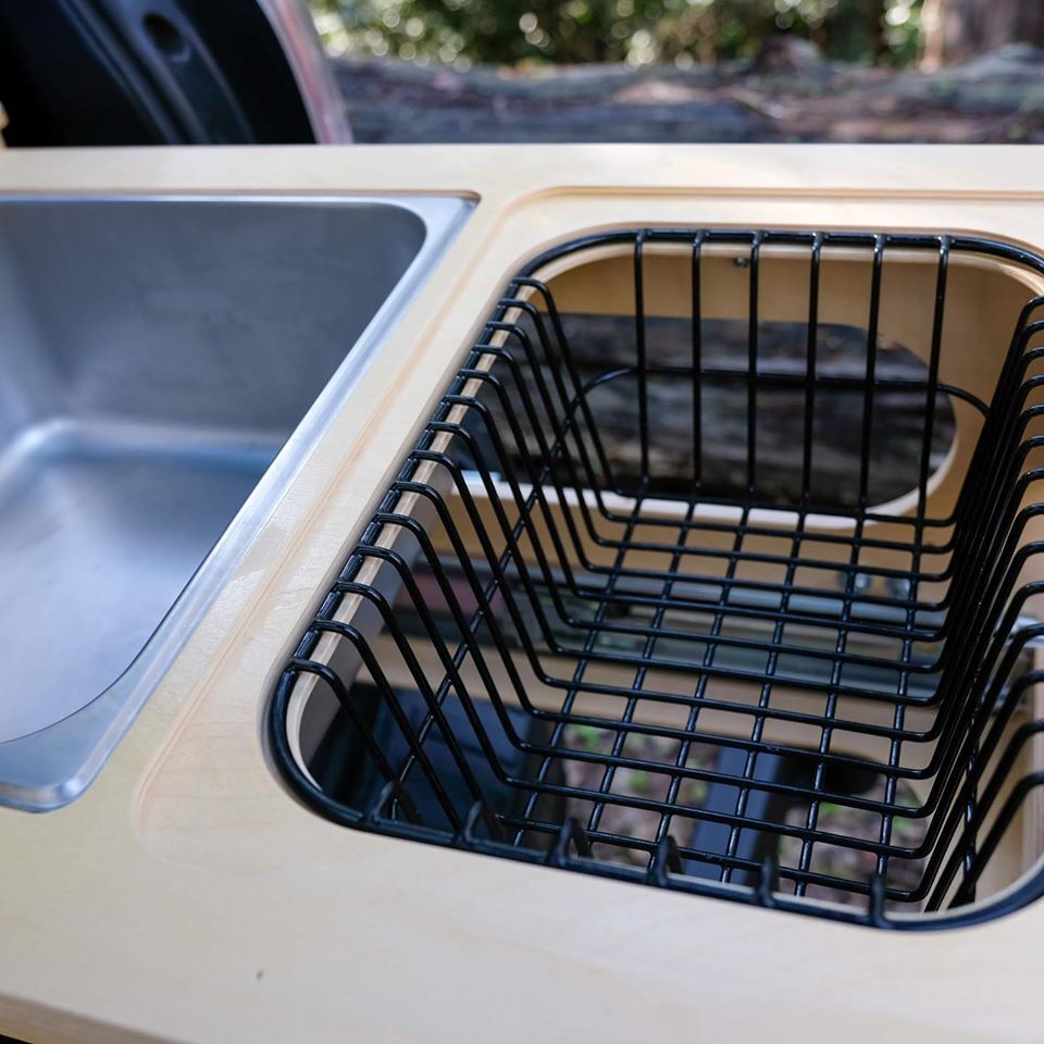 The rinse basket is a nice idea not included on other camp kitchens, providing integrated space for drying (or simply storing) dishes and food