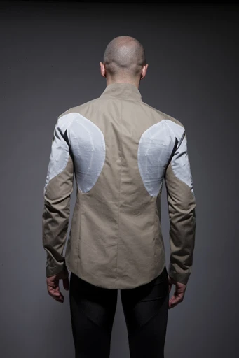 The jacket is made of organic cotton with additional water-resistant layers that we gather do not sacrifice the jacket's breathability