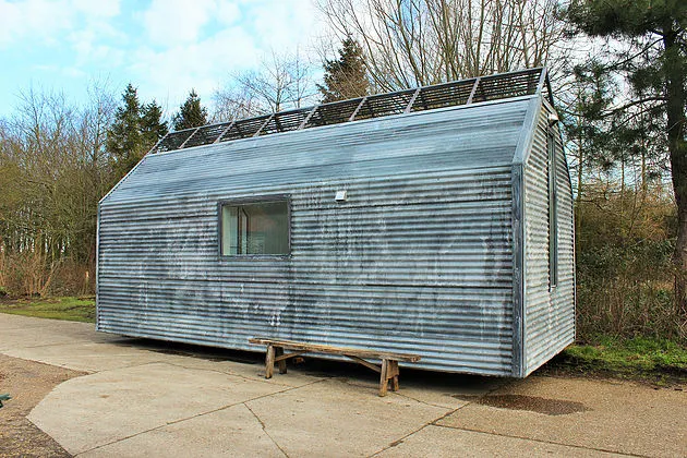 The exterior is clad in corrugated steel