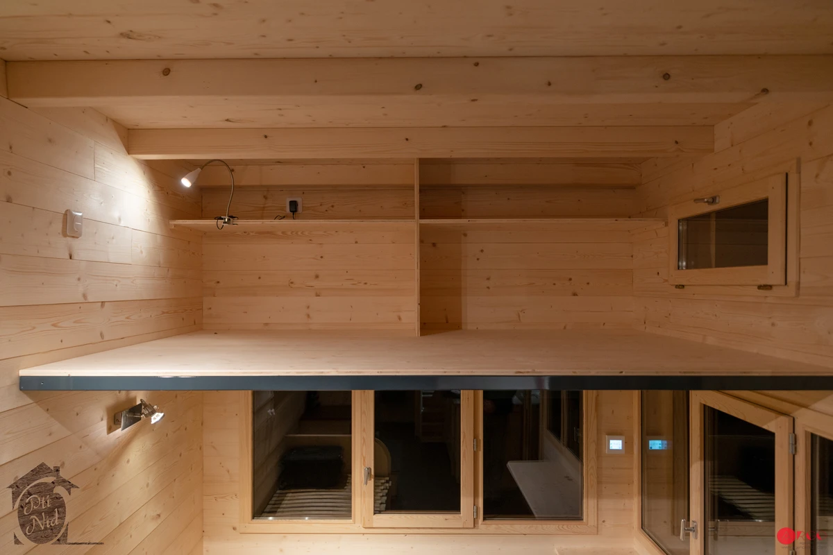 The Axelle's living room is topped by a small loft