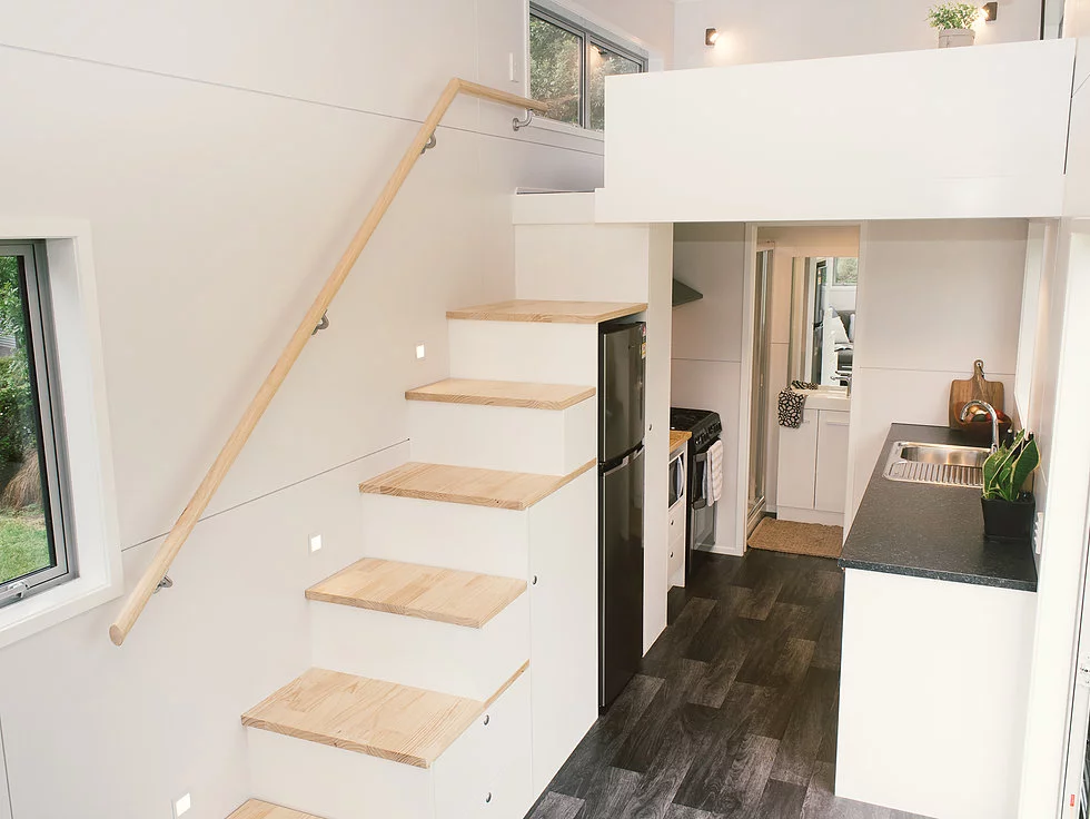 The Buster Tiny House's storage-integrated staircase