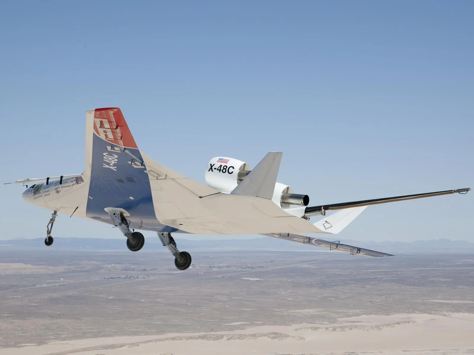 The long boom protruding from between the tails is part of the aircraft's parachute-deployment flight termination system (Photo: NASA / Carla Thomas)