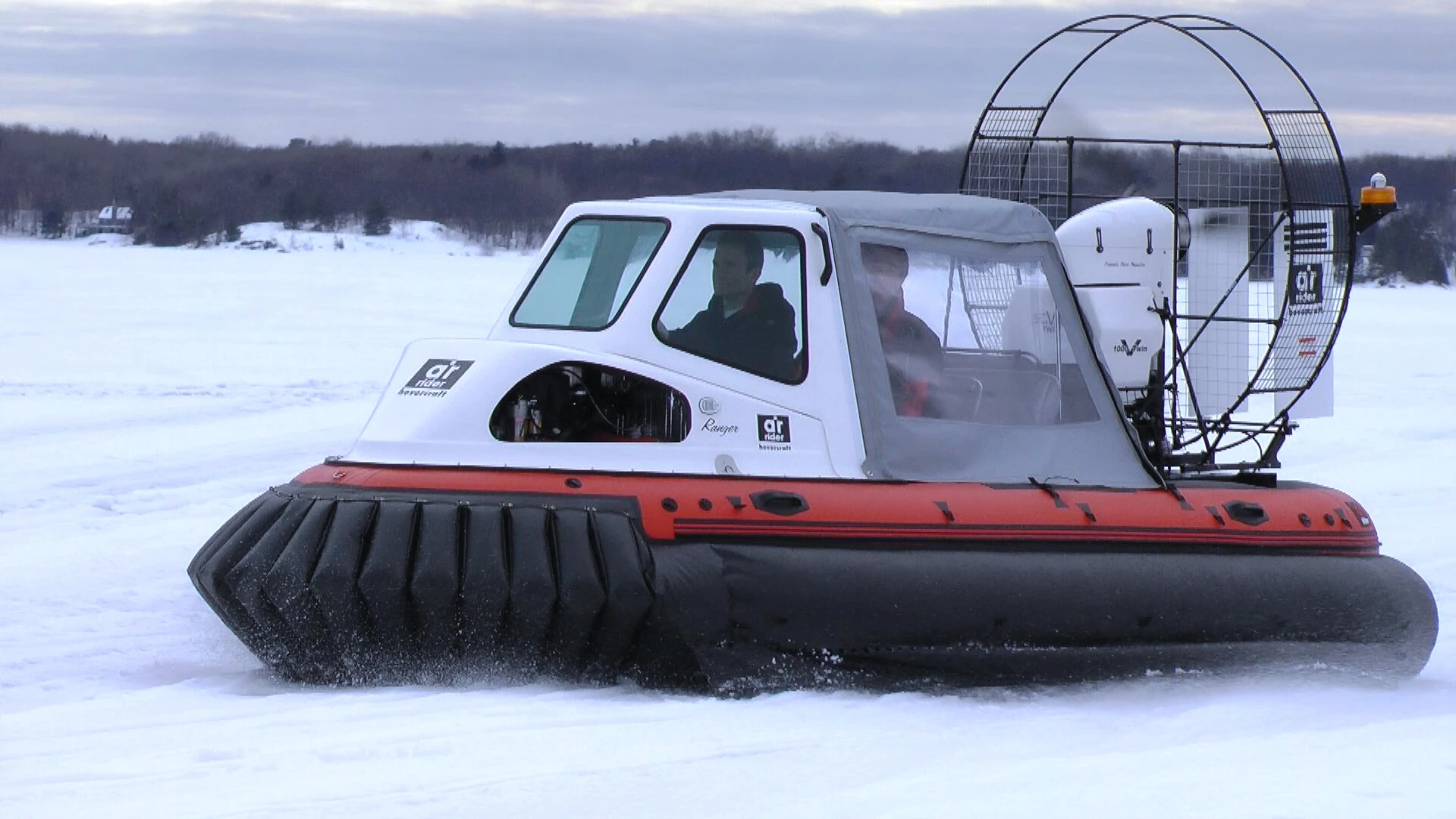 The AirRider hovercraft in snow conditions with weather canopy