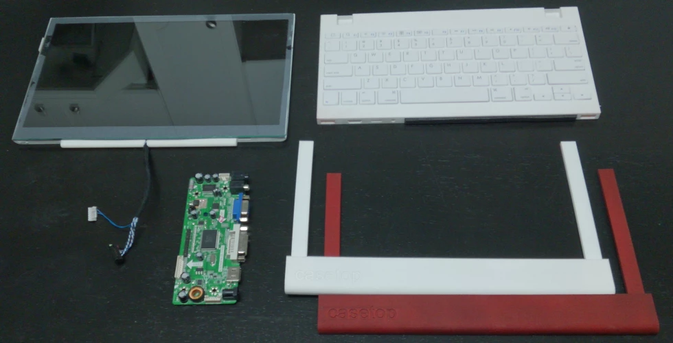 The main components of the Casetop – an 11.1-inch LCD panel, island-style keyboard, a dual-LVDS controller board, and passive frontbars