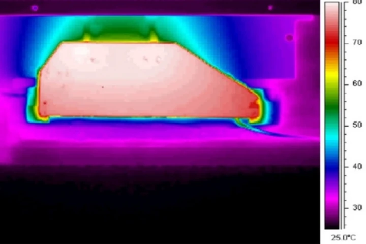Infra-red image of an optimized EHD-cooled laptop after three minutesImage credit: Tessera