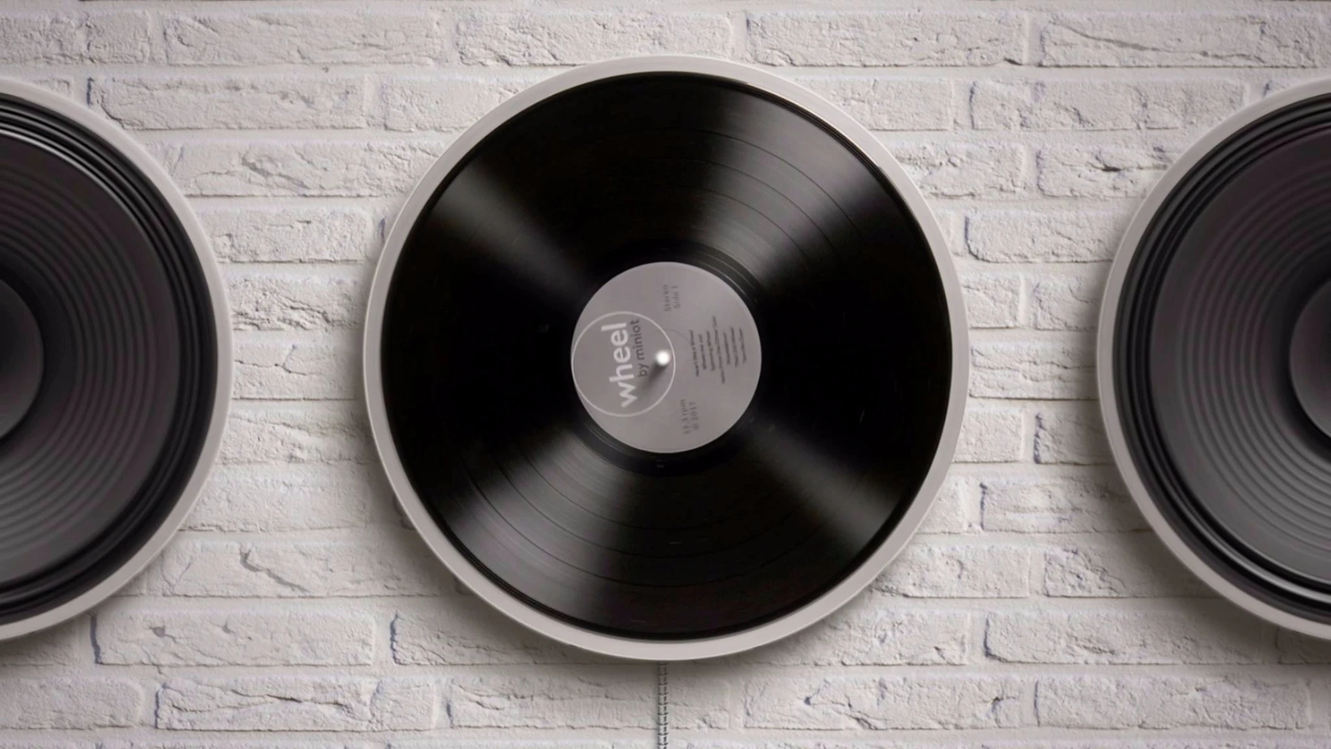The Wheel turntable can be mounted on a wall for arty vertical play