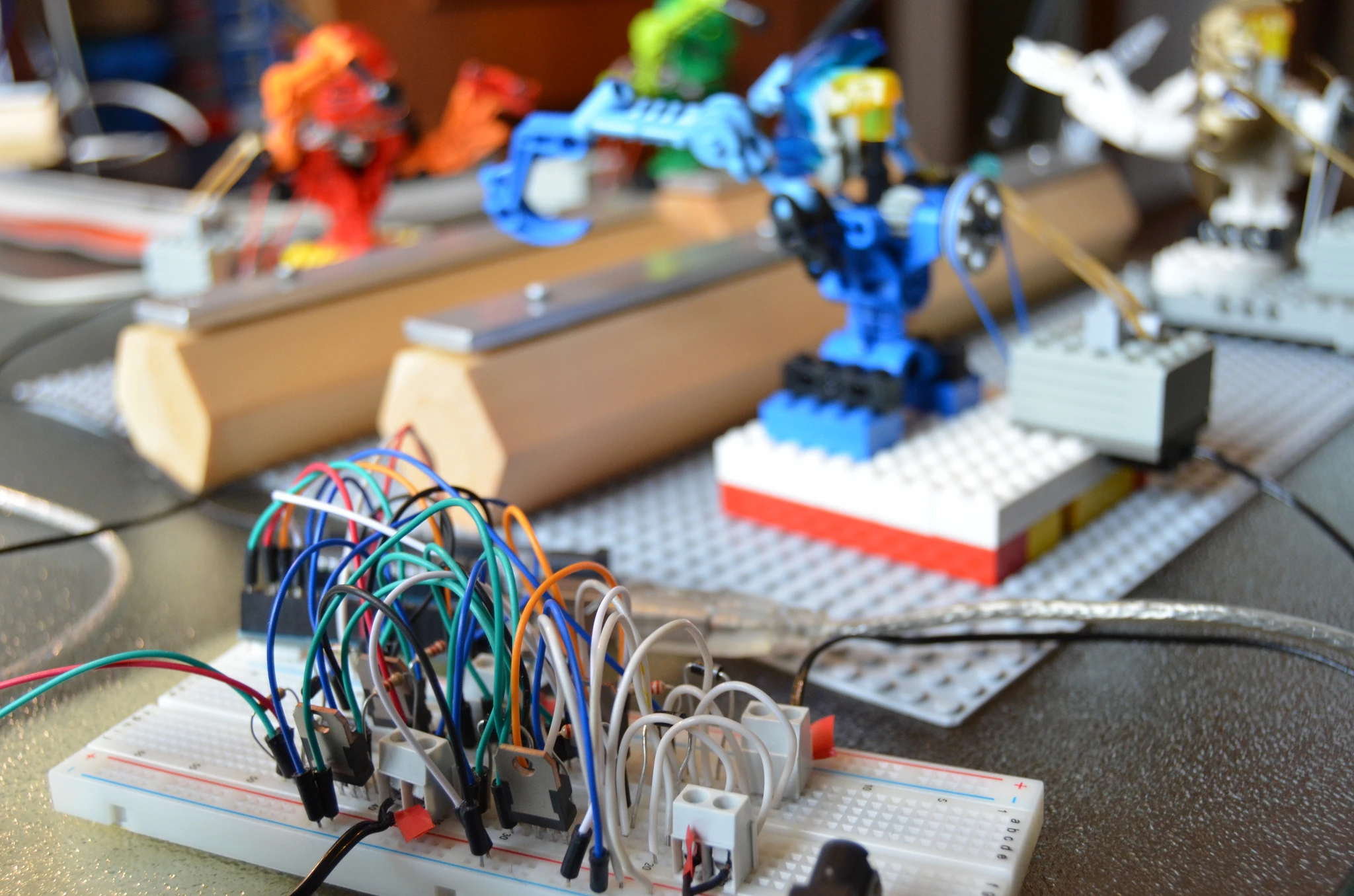 Each member of the band is constructed from LEGO Bionicle pieces rigged with rubber bands and pulleys