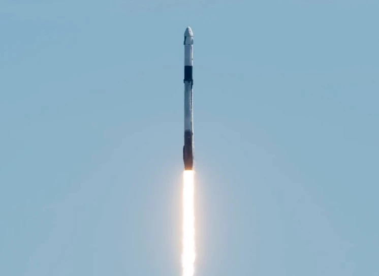 A SpaceX Falcon 9 rocket carrying the company's Crew Dragon spacecraft is launched on Axiom Mission 1 (Ax-1)
