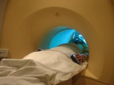 A subject performs a routine task in an fMRI brain scanner (Image: Courtesy of Kalina Christoff)