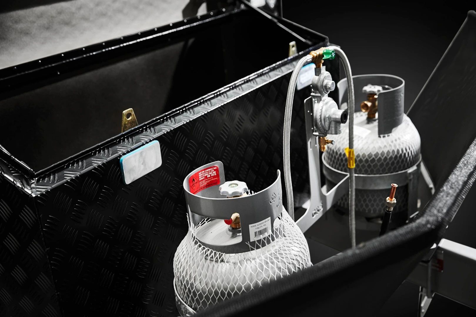 The Off Grid has two 10-lb gas tanks