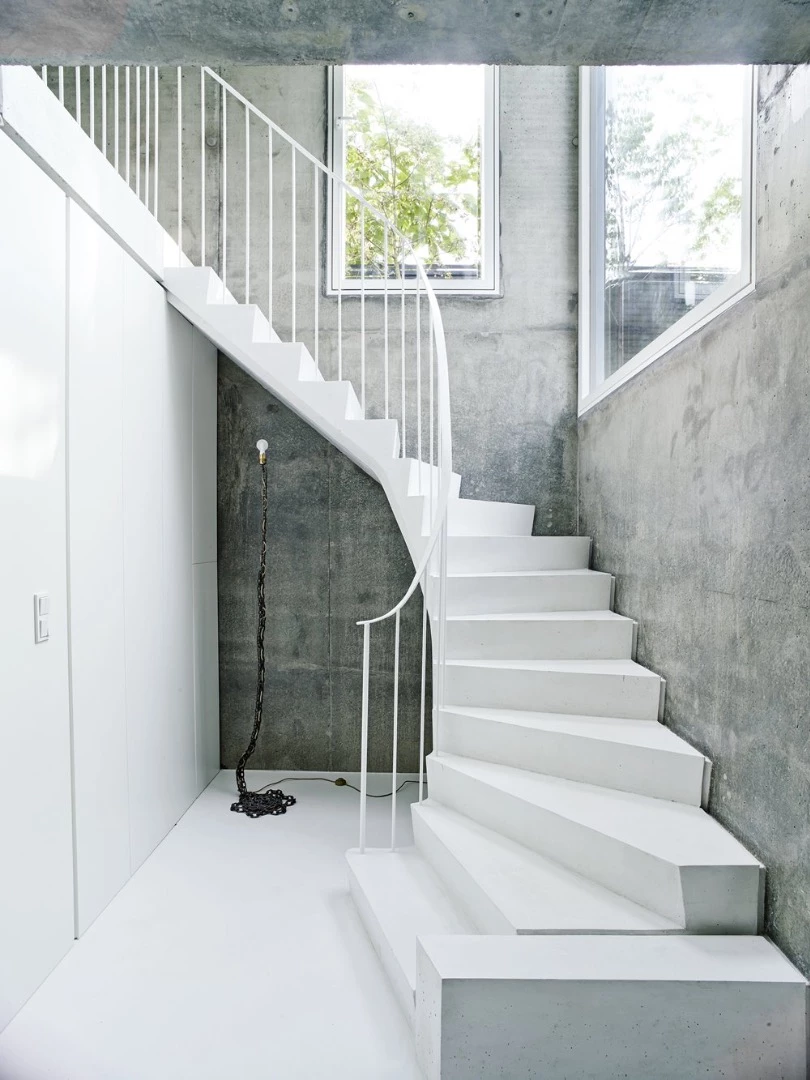The interior decor of Covert House is beautifully brutal and dominated by unfinished cast concrete (Photo: Hélène Binet)